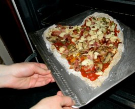 Place the pizza in the oven.